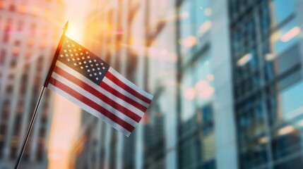 A striking american flag flowing elegantly in the wind above a majestic urban cityscape view