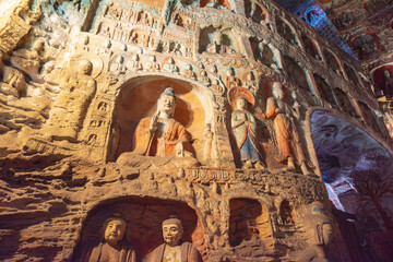 Naklejka premium Giant Buddha statue at the Yungang Grottoes in Datong, Shanxi