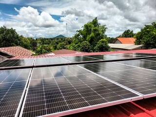 Installing solar panels on the roof to use as alternative energy for electricity.