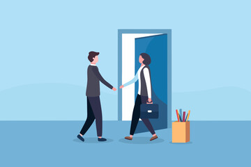 Business handshake at the doorway with a woman carrying a briefcase and a man in a suit