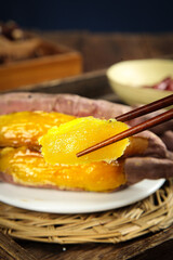 Golden Roasted Sweet Potato with Chopsticks - Traditional Asian Food Photography