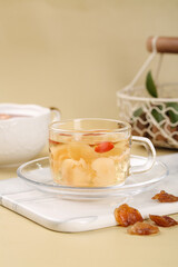 Chinese Longan Herbal Tea with Dried Fruits - Traditional Yunnan Health Drink in Glass Cup