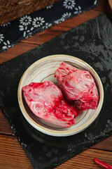 Fresh Rabbit Heads in Bowl Traditional Chongqing Chinese Cuisine Ingredient Raw Meat Food Photography