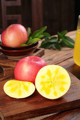 Fresh Red Fuji Apples from Yunnan Luochuan Market on Wooden Board with Cross Section