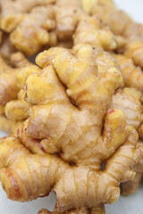 Fresh Yunnan Plateau Ginger Roots on Display Shelf - Natural Cooking Spice Ingredient
