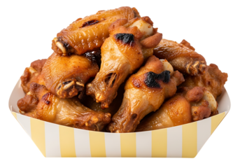 A generous serving of crispy golden brown fried chicken wings in a striped paper tray isolated on transparent background