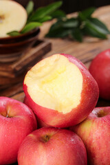 Fresh Red Fuji Apples with Heart-Shaped Cut Apple Closeup on Wooden Background