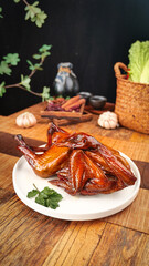 Roasted Duck with Crispy Skin Traditional Asian Cuisine Served on Rustic Wooden Table