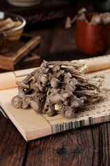 Dried Morel Mushrooms on Vintage Book Pages - Gourmet Cooking Ingredients