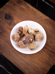Dried Shiitake Mushrooms in Bowl on Wooden Board - Asian Cooking Ingredients
