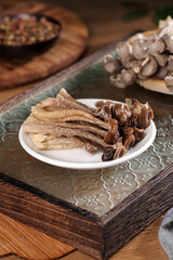 Asian Mushroom and Bamboo Shoot Ingredients with Colorful Cooking Setup for Traditional Soup and Tea