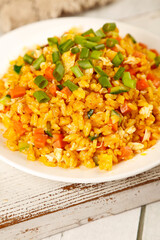 Golden Egg Fried Rice with Vegetables and Green Onions - Asian Food Specialty