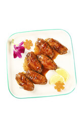 Glazed Chicken Wings with Sweet Sauce on White Plate Restaurant Style Presentation