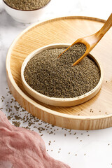 Highland millet grains in wooden bowl - organic superfood ingredient for healthy cooking