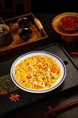 Special Golden Yangzhou Fried Rice Chinese Cuisine with Traditional Tea Set and Spices