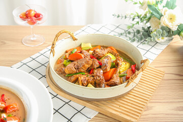 Drunken Goose Stew with Potatoes in Casserole - Traditional Country Style Flame-Cooked Dish