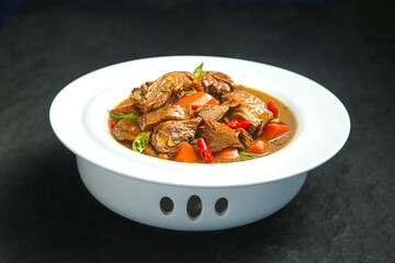 Classic Country Goose Stew with Potatoes in Traditional White Ceramic Pot - Rustic Farmhouse Cuisine