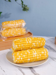 Fresh Golden Corn Cobs on White Plate - Healthy Vegetable Food Photography
