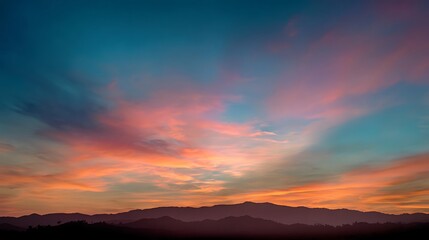 Awesome photo of colorful sunset over the mountains with clouds in the sky landscape.