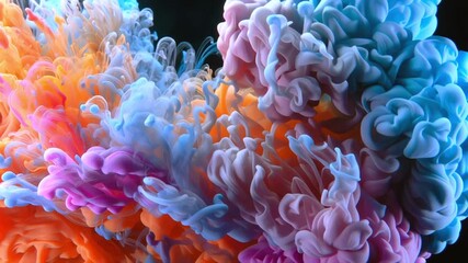 Colorful ink dynamically swirling underwater, blending into hypnotic abstract patterns with fluid movement against deep dark backdrop - Powered by Adobe