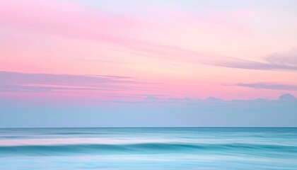 Soft pastel ocean view features blended blue water under a pink and purple sky, evoking tranquility and peace
