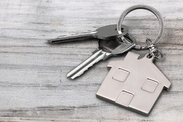 Set of house metal house keys on the table