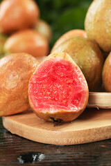 Fresh Red Guava Fruit Cut Half Wooden Board Tropical Asian Fujian Soft Flesh Seeds