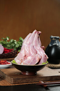 Fresh Raw Rabbit Meat Foreleg Cuts in Bowl Ready for Cooking Traditional Asian Cuisine