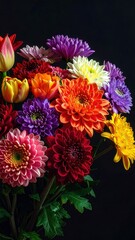 Vibrant assortment of colorful flowers including tulips and chrysanthemums arranged against a dark background, highlighting their rich textures