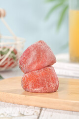 Traditional Dried Persimmons from Fuping Shaanxi China Stacked on Wooden Board