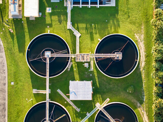 Aerial view of water treatment factory at city wastewater cleaning facility. Purification process of removing undesirable chemicals, suspended solids and gases from contaminated liquid
