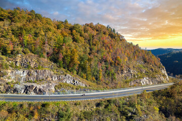 Highway road in USA. American freeway road with fast driving cars. Transportation infrastructure in North Carolina Appalachian mountains