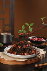 Stir-Fried Preserved Vegetables with Peanuts - Traditional Asian Cuisine on White Plate