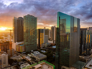 Miami, Florida, USA. Aerial view of American downtown office district at sunset. High commercial and residential skyscraper buildings in modern US city