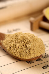 Fresh Ground Ginger Powder Spice on Wooden Spoon Asian Kitchen Cooking Ingredient