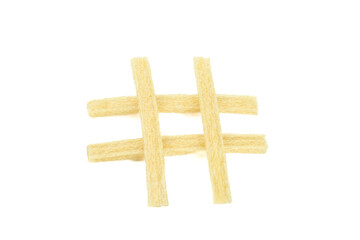 Hashtag Symbol Made from Wheat Pasta on White Background - Social Media Food Art Concept