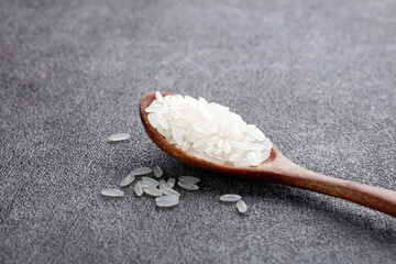 Fresh White Rice Grains in Wooden Spoon - Premium Quality Grain for Cooking