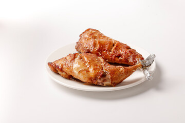 Spicy Sichuan Roasted Rabbit Legs Chinese Cuisine Traditional Dishes Golden Crispy Skin White Plate