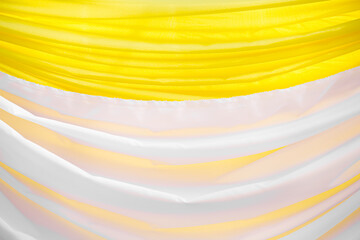 Wrinkle white and yellow fabric texture abstract background