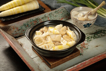 Traditional Asian Chicken Bamboo Shoot Soup in Clay Pot with Fresh Ingredients