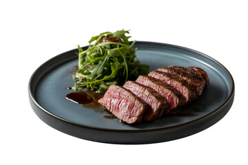 Delicious sliced steak and green vegetable garnish served on a modern plate isolated on transparent background