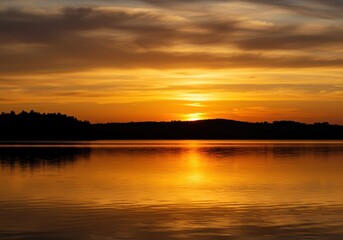 Golden sunset over lake