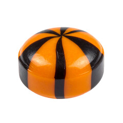 Round caramel candy for Halloween, lollipop. Orange and black striped candy isolated on white background.