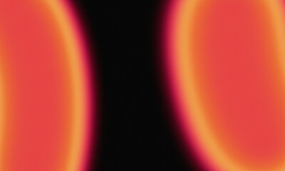 Abstract image with blurred orange and red shapes against a black background.