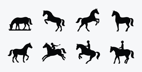 Fototapeta premium Collection of horse silhouettes in different poses on a white background