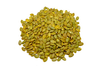 Fresh pumpkin seeds on white background close-up view 