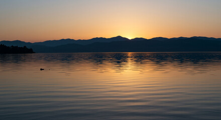 Fototapeta premium Reflections in a calm lake inner peace metaphor