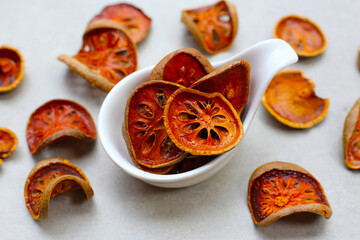Dried bael slices used for herbal tea.