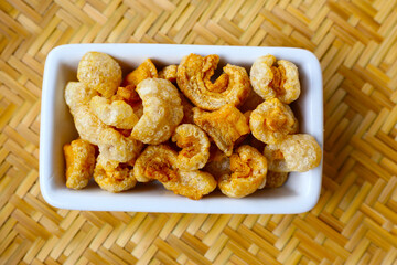 Crispy pork cracklings, a crunchy savory snack.