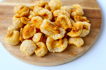 Crispy pork cracklings, a crunchy savory snack.